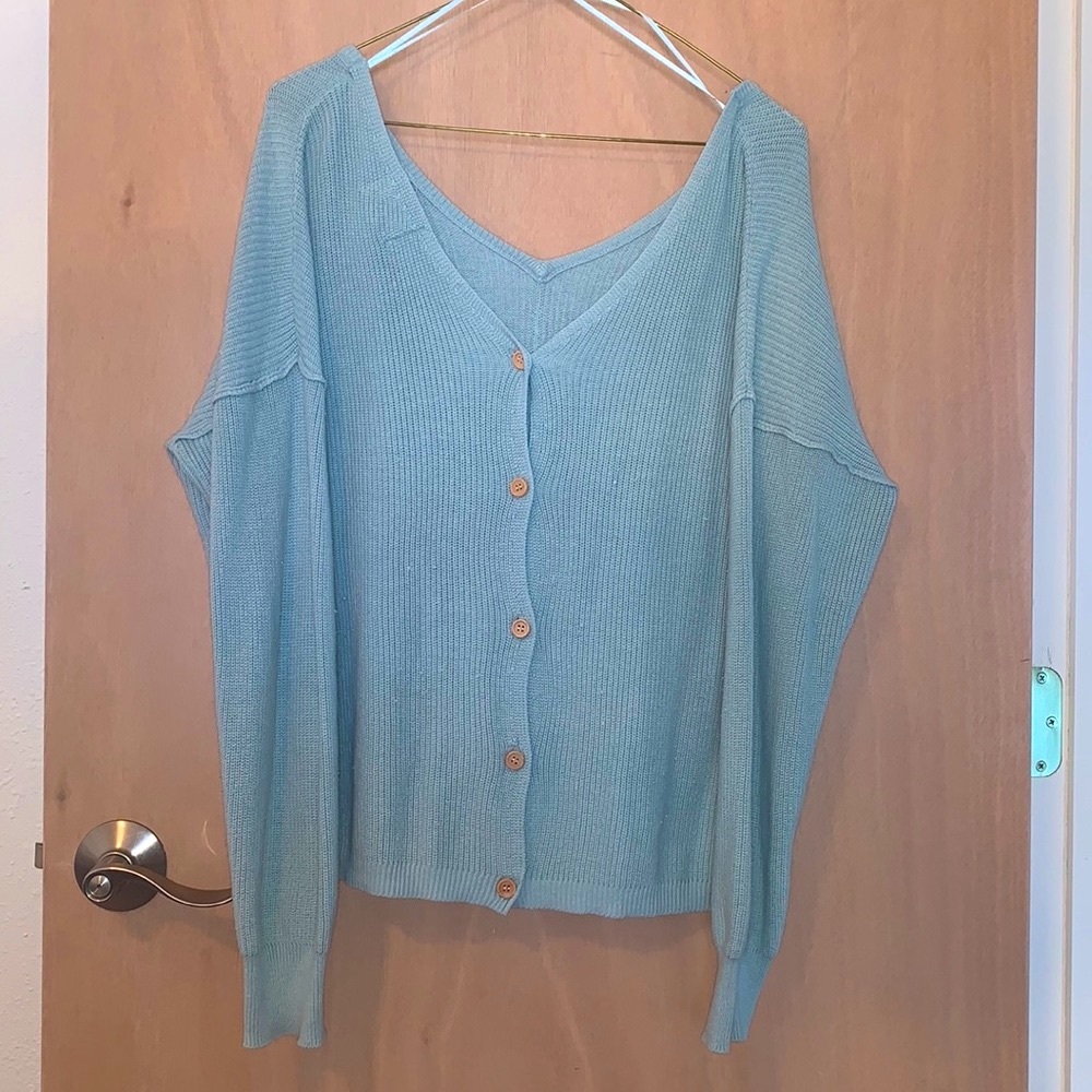 Off the shoulder knit/woven sweater. Button down